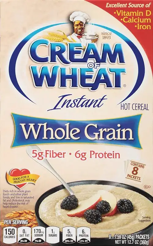 Whole grain cereal with blackberries and spoon.