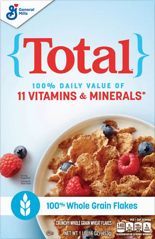 Cereal box with flakes, raspberries, and blueberries displayed.