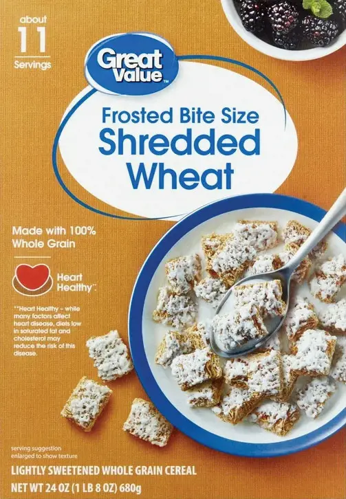 Cereal box with frosted shredded wheat and spoon.