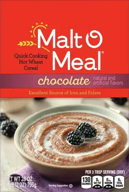Chocolate hot wheat cereal with fresh blackberries on top.