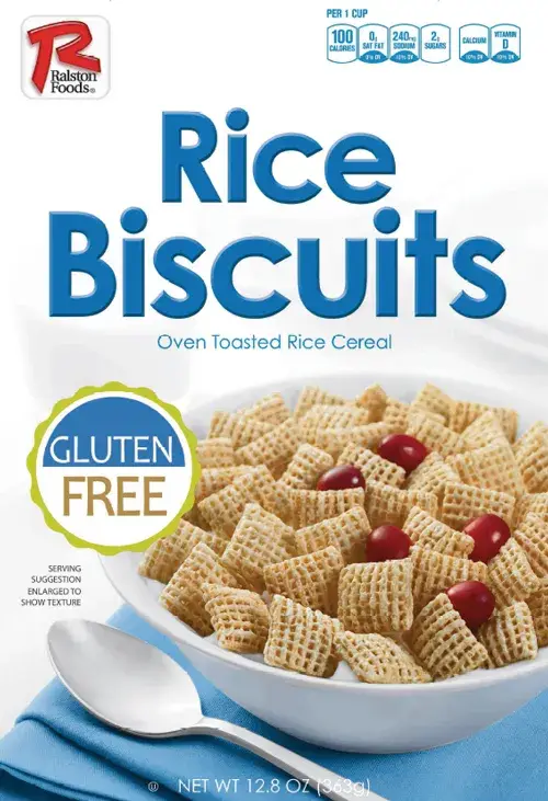 Gluten-free rice cereal with red berries in bowl.